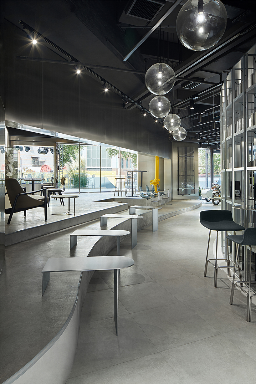 tailor WEY applies cool metallic surfaces to futuristic coffee lab in shanghai designboom