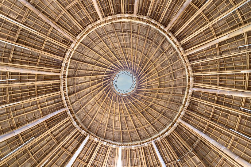 chiangmai life architects builds concentric bamboo school library with oculus in thailand