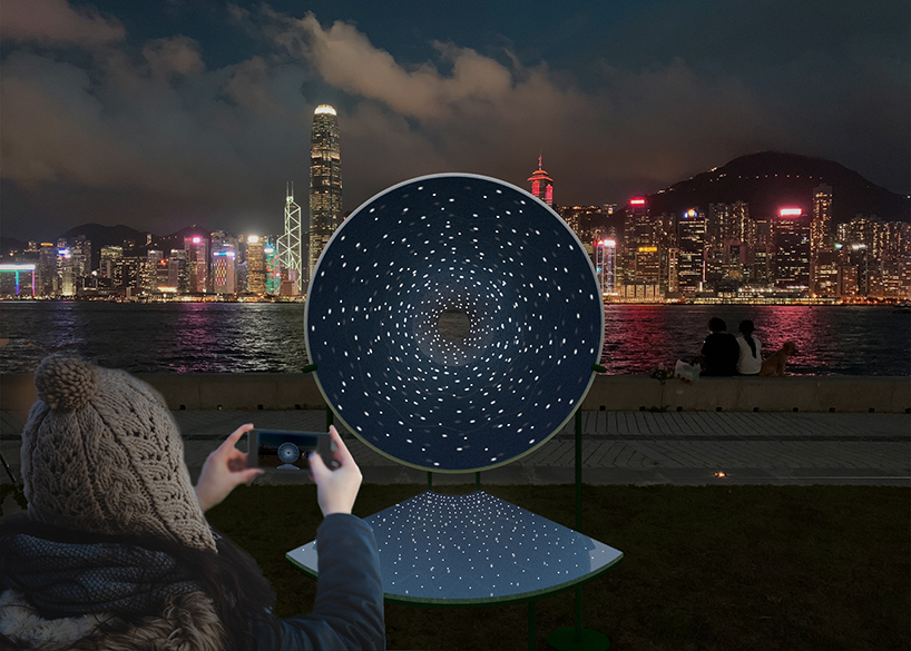 studio etain ho designs 'cone of radiance' light installation to brings joy & comfort to hong kong
