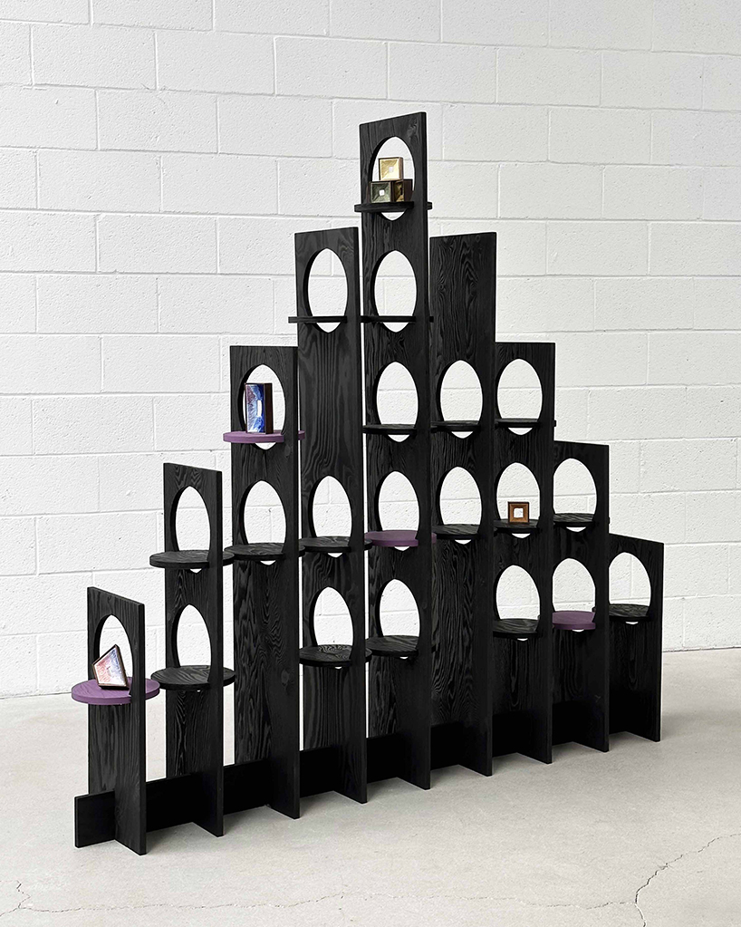 woocheol shin pierces dark wood furniture with circular openings for porthole series