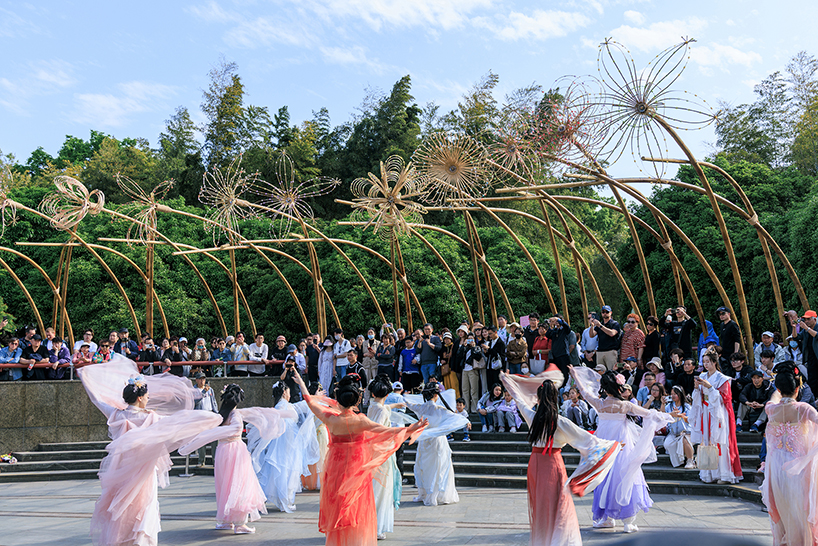 woven bamboo canopy forms floral field bending over sunken urban plaza in shanghai - 5