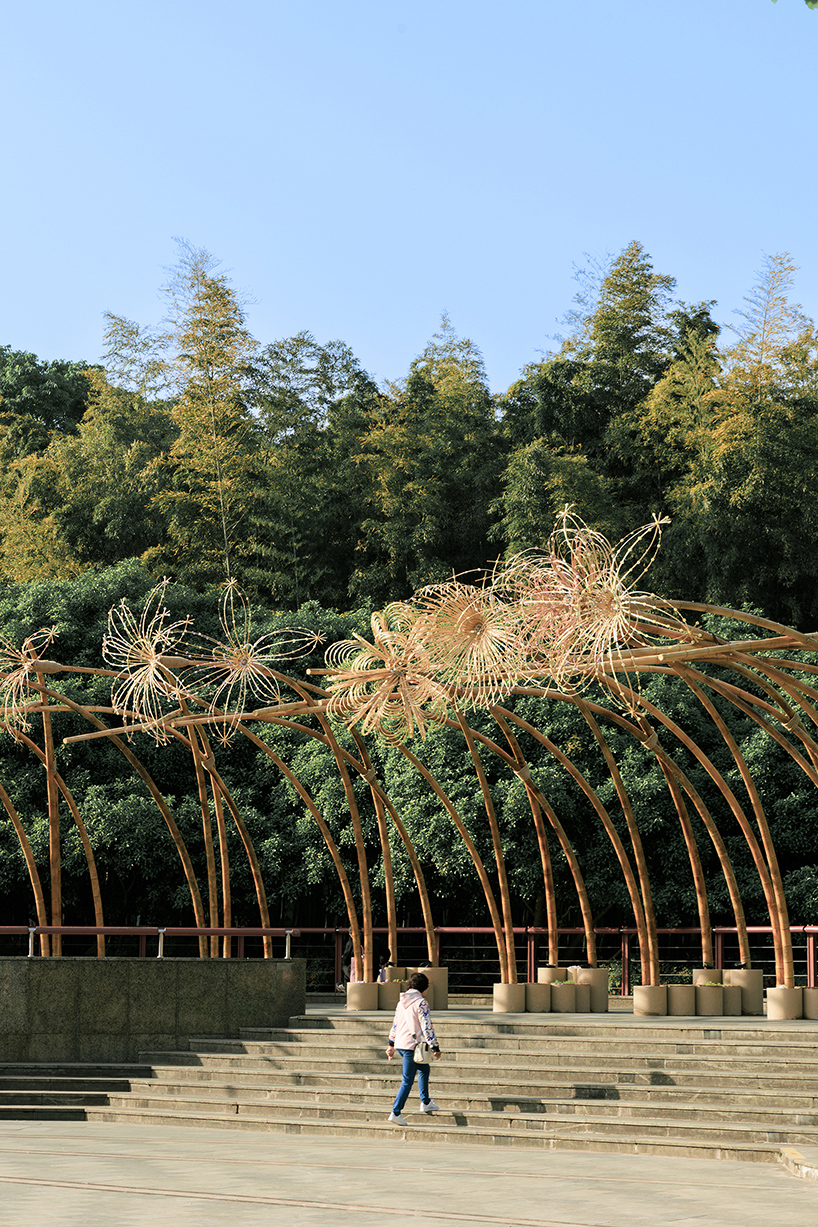 woven bamboo canopy forms floral field bending over sunken urban plaza in shanghai - 4