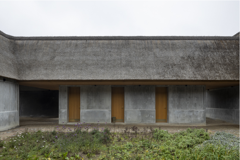 NORRØN adds a modern twist to farmhouse living in rural denmark designboom