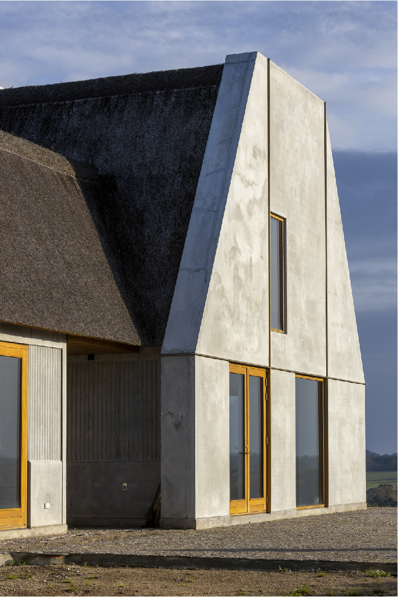 NORRØN adds a modern twist to farmhouse living in rural denmark designboom