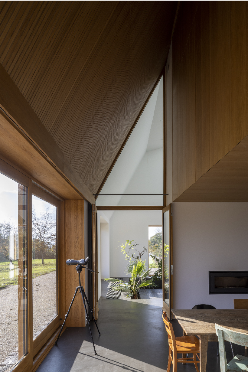 NORRØN adds a modern twist to farmhouse living in rural denmark designboom