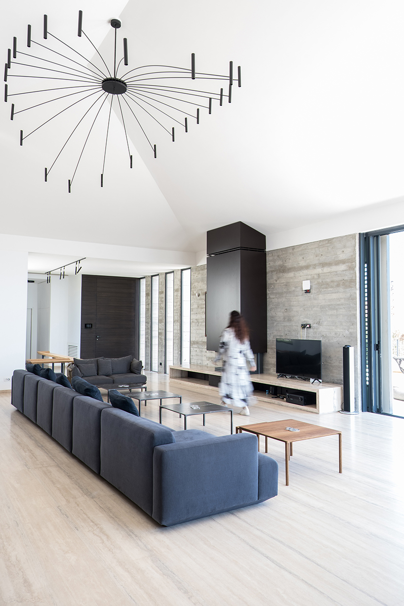 rab architects designs a house with sliding travertine walls in lebanon designboom