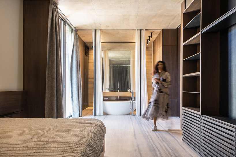 rab architects designs a house with sliding travertine walls in lebanon designboom