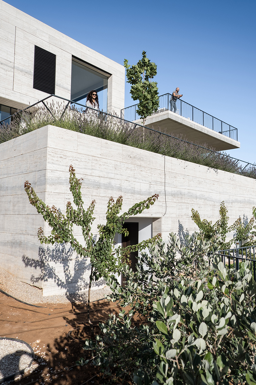 rab architects designs a house with sliding travertine walls in lebanon designboom