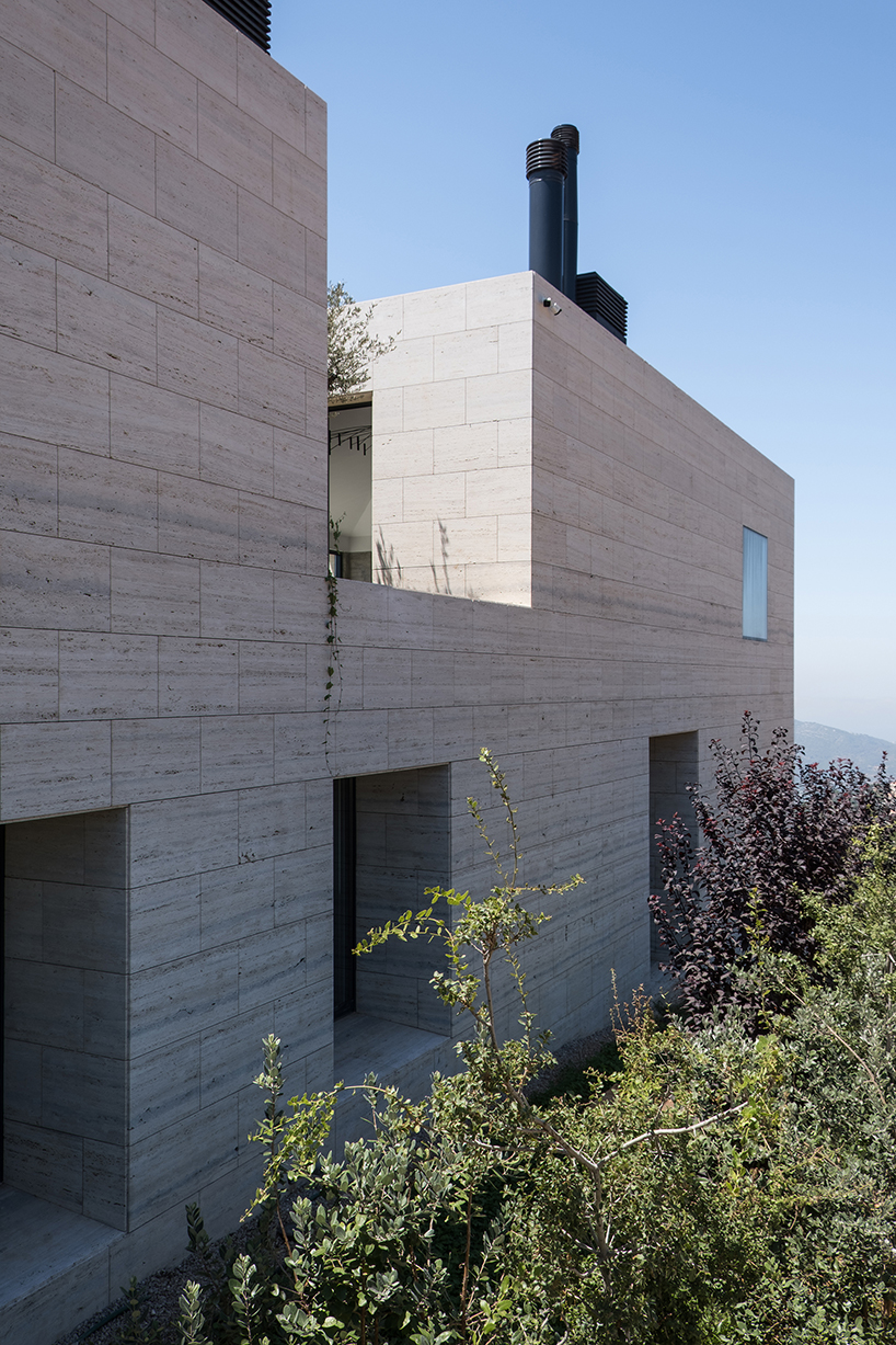 rab architects designs a house with sliding travertine walls in lebanon designboom