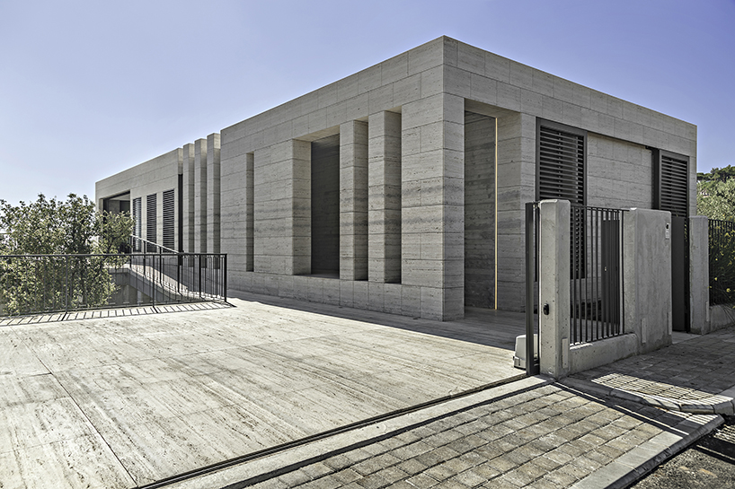 rab architects designs a house with sliding travertine walls in lebanon designboom