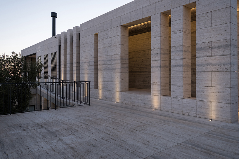 rab architects designs a house with sliding travertine walls in lebanon designboom