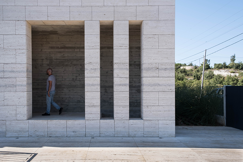 rab architects designs a house with sliding travertine walls in lebanon designboom