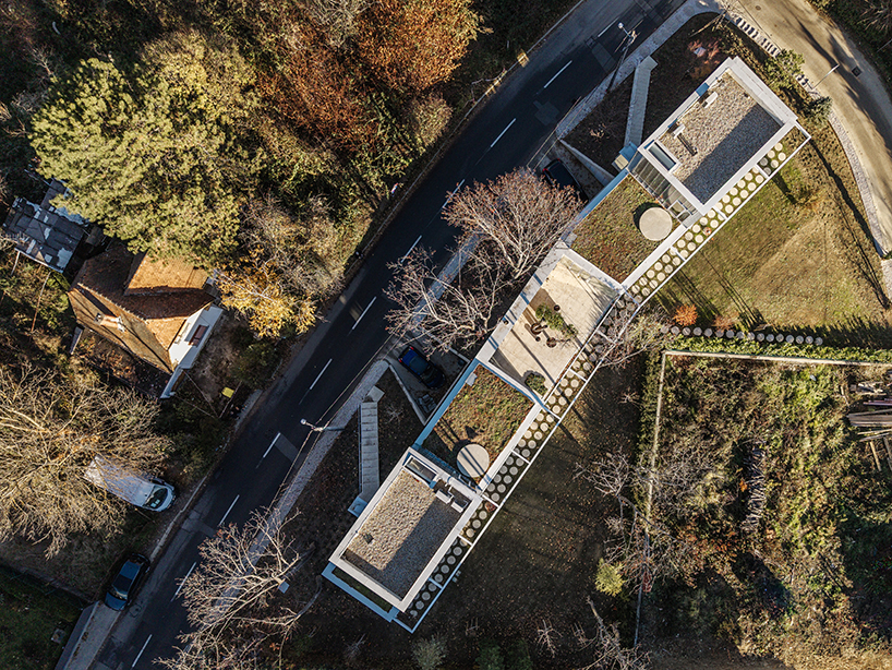 The pierced brick facade dressed in horizontal double bukovac of njiric+ architekti in Zagreb