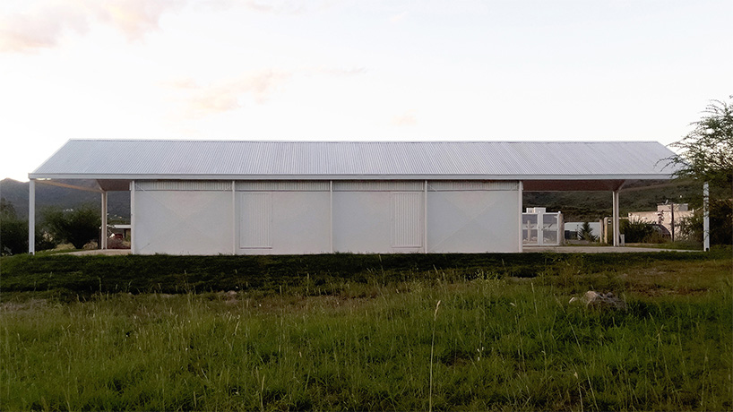 open structural steel grid by estudio BNAA reinterprets barn typology in argentina