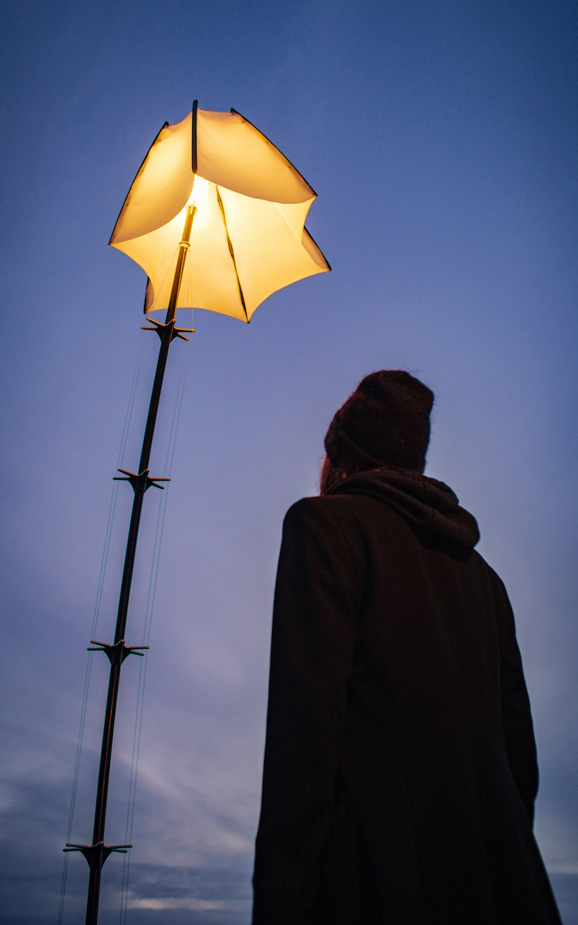VOUW studio curious street lamp that bends down to greet you designboom