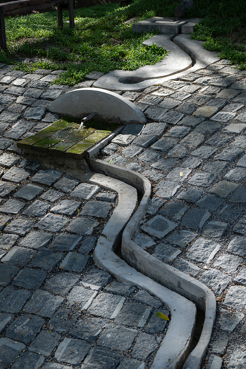 wooden shingles form housescape design lab's organic shelter in thailand
