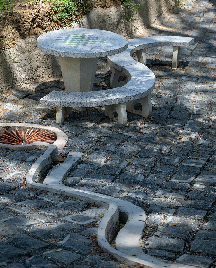 wooden shingles form housescape design lab's organic shelter in thailand