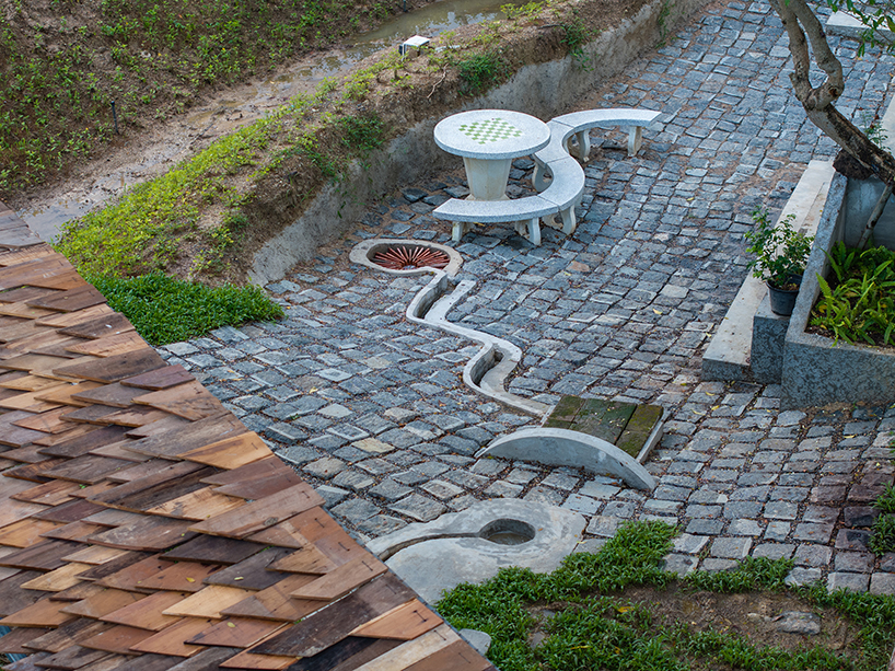 wooden shingles form housescape design lab's organic shelter in thailand