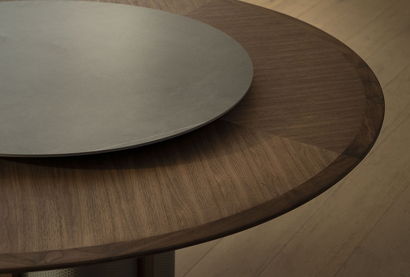 an ancient chinese proverb inspires tian li’s round table with slate turntable