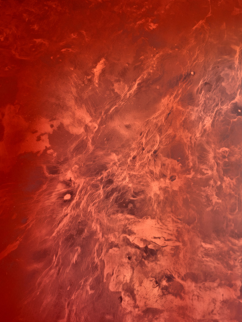 copper planet installation and red undulating seating anchor venus lounge by asap/ in beijing