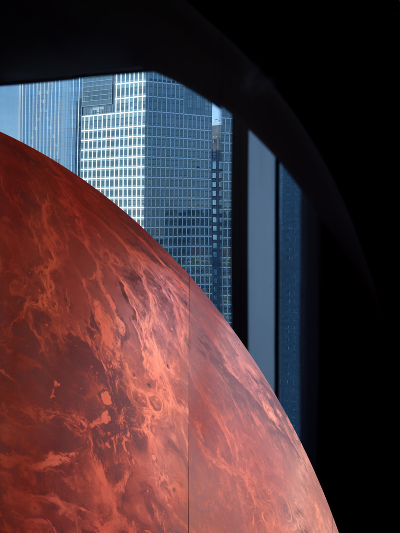 copper planet installation and red undulating seating anchor venus lounge by asap/ in beijing