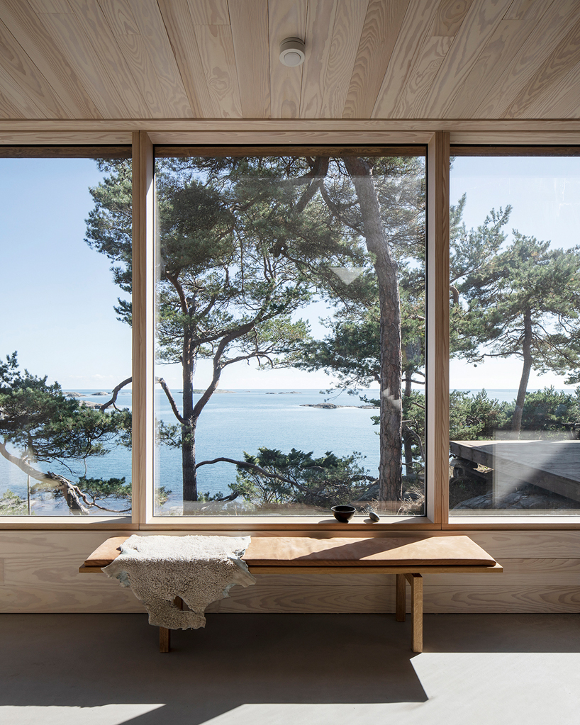 a house made of oak plank offcuts stands on the south coast of norway