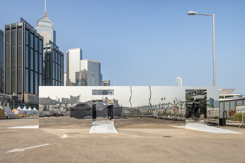 Mirror Maze's Reflective Pathways Distort Hong Kong's Harborfront