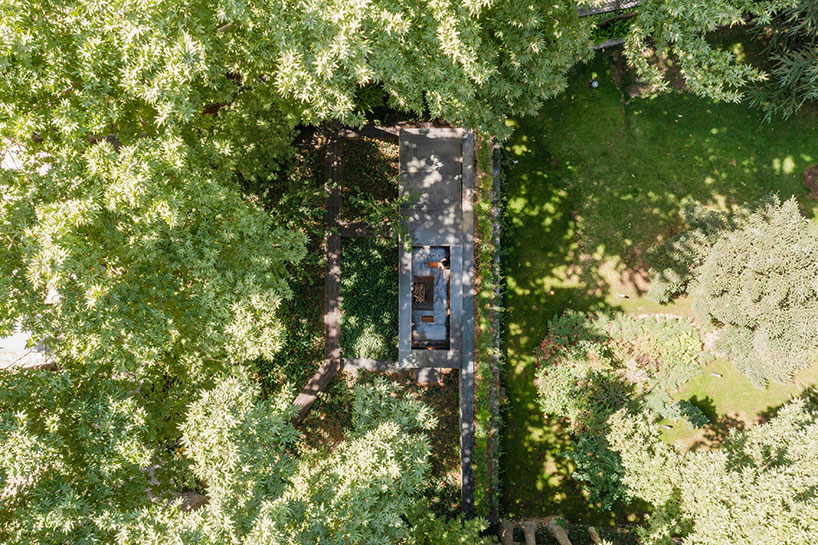 reconstructed steel lodge by pragmatica emerges from the greenery in iran