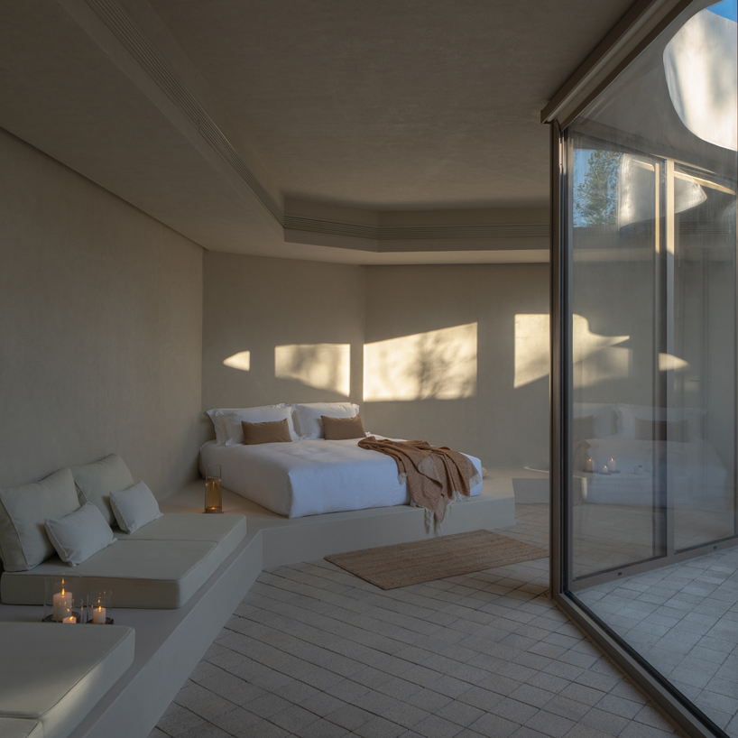 cluster of interwoven white courtyard houses reinterprets ancient kilns for resort in china