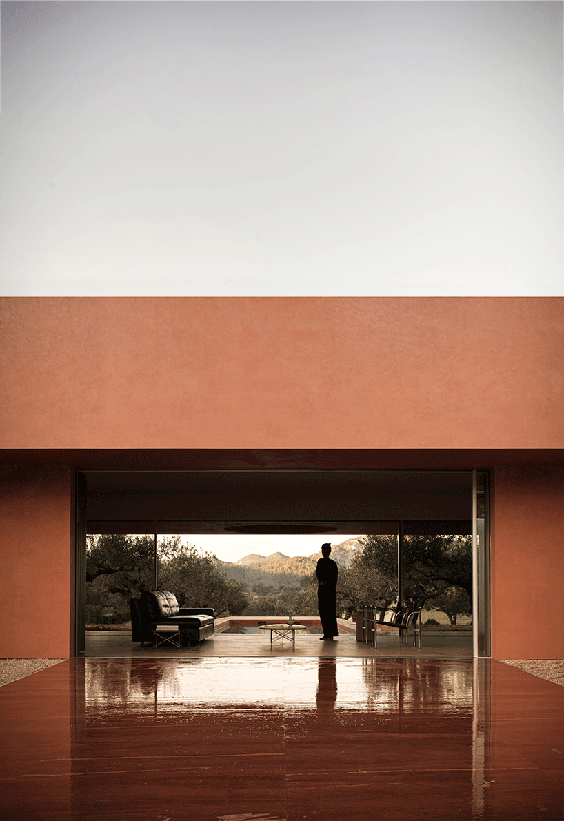 balzar arquitectos plants valencian residence's red steel volume in an olive grove
