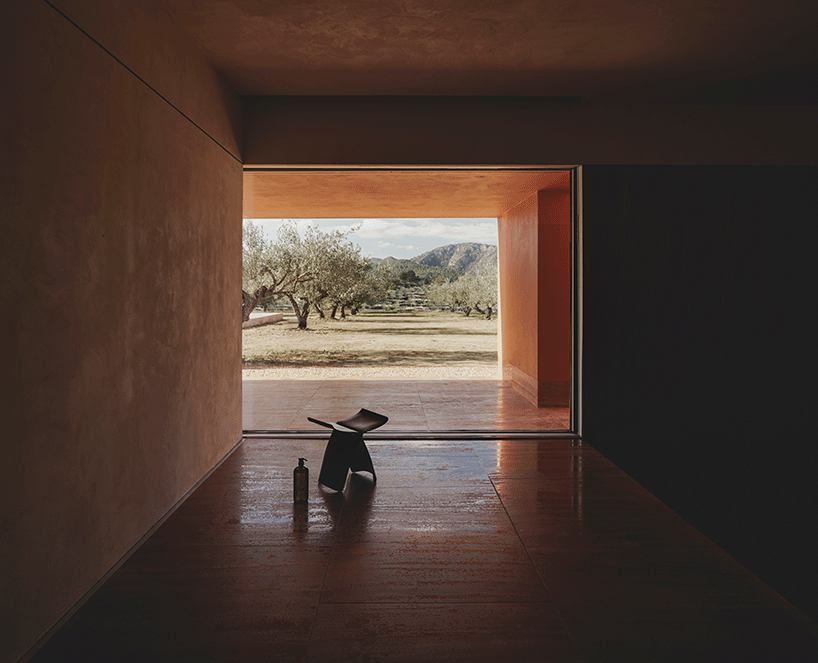 balzar arquitectos plants valencian residence's red steel volume in an olive grove