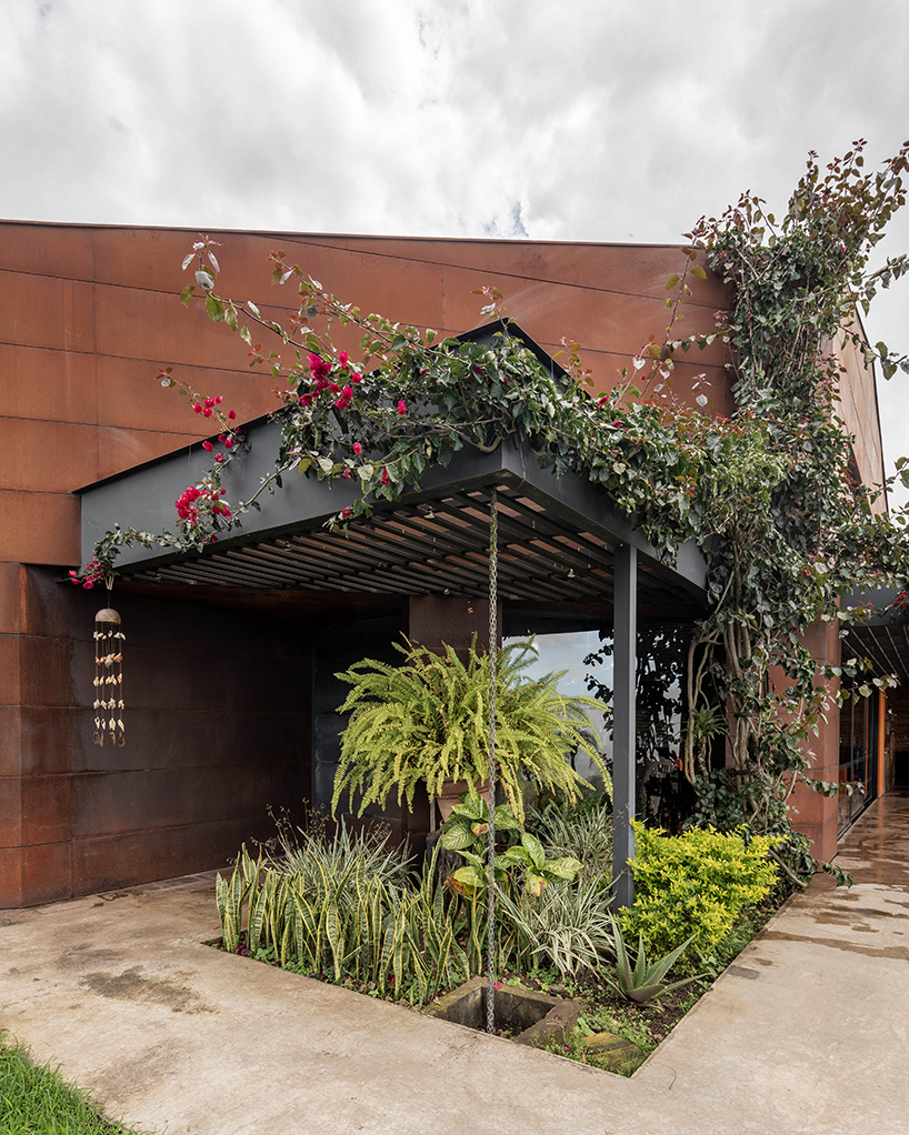 old warehouse is transformed into modern country house in ecuador by sebastián mora