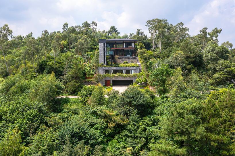 Stone-Clad House Design In The Forest With Open Views Towards The Panoramic  Garden 