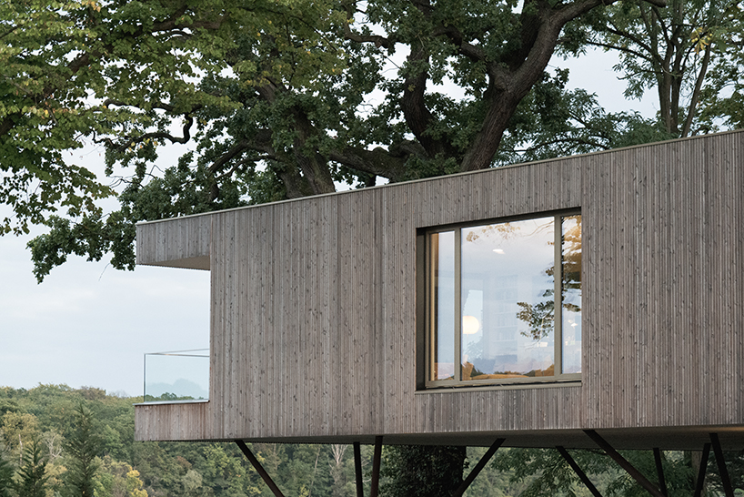 carlos zwick designs elevated lake house in potsdam germany 2
