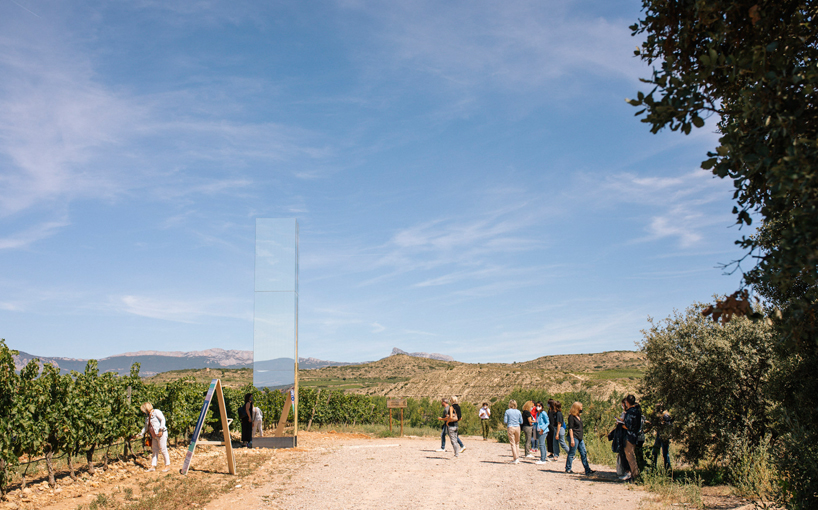 mirror-clad tower by alejandro ramírez emerges as ephemeral landmark within vineyard in logroño, spain