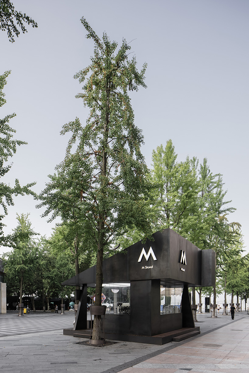 triangular volumes characterize this café pavilion in hangzhou, china 