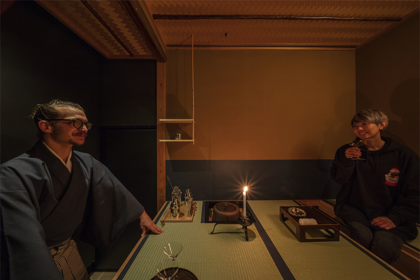elevated teahouse interior in tokyo morphs traditional japanese- into western-style