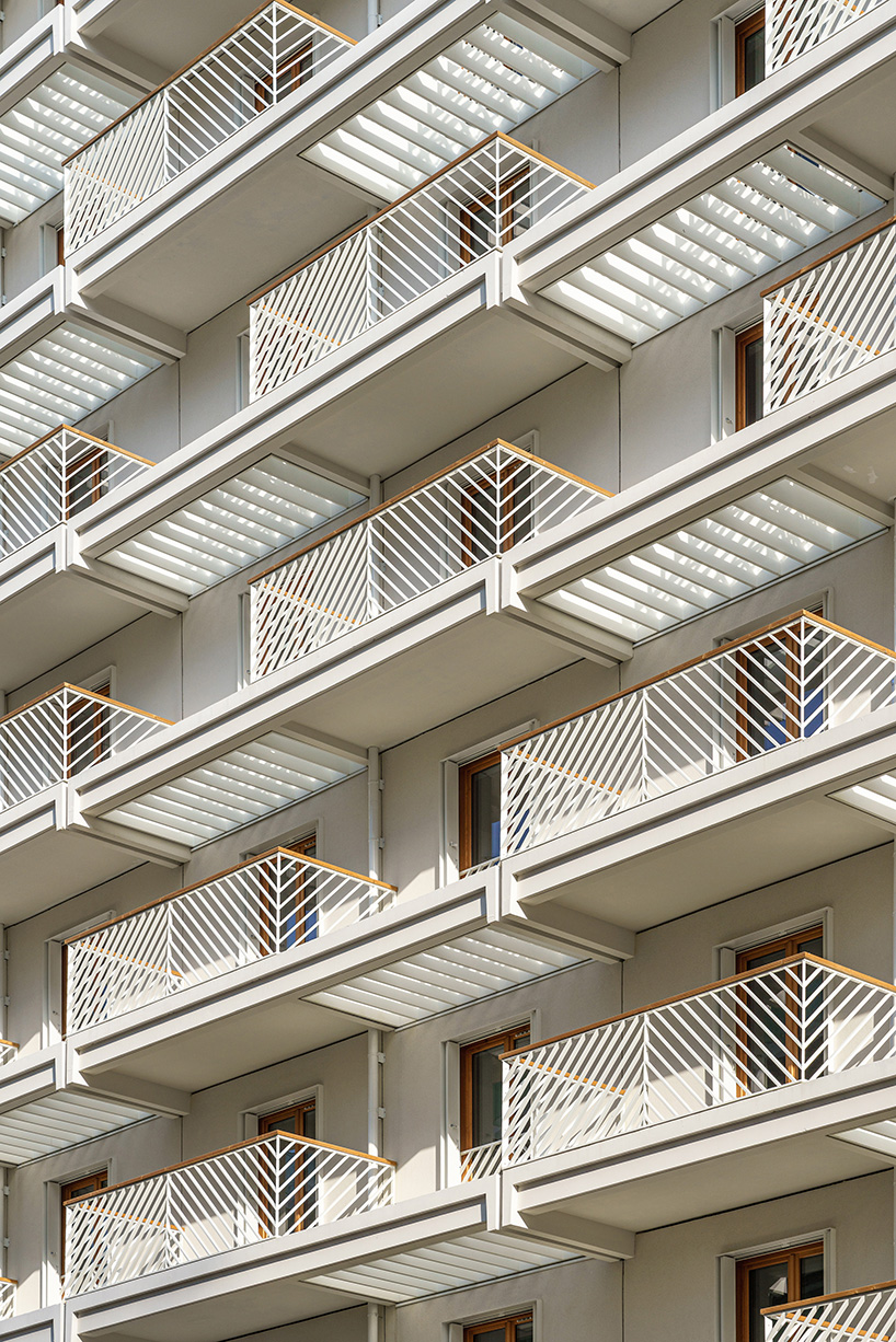 Baldosas de terracota mate con dibujos dinámicos delinean la aldea de los atletas de París