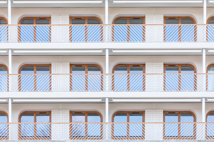 Baldosas de terracota mate con dibujos dinámicos delinean la aldea de los atletas de París