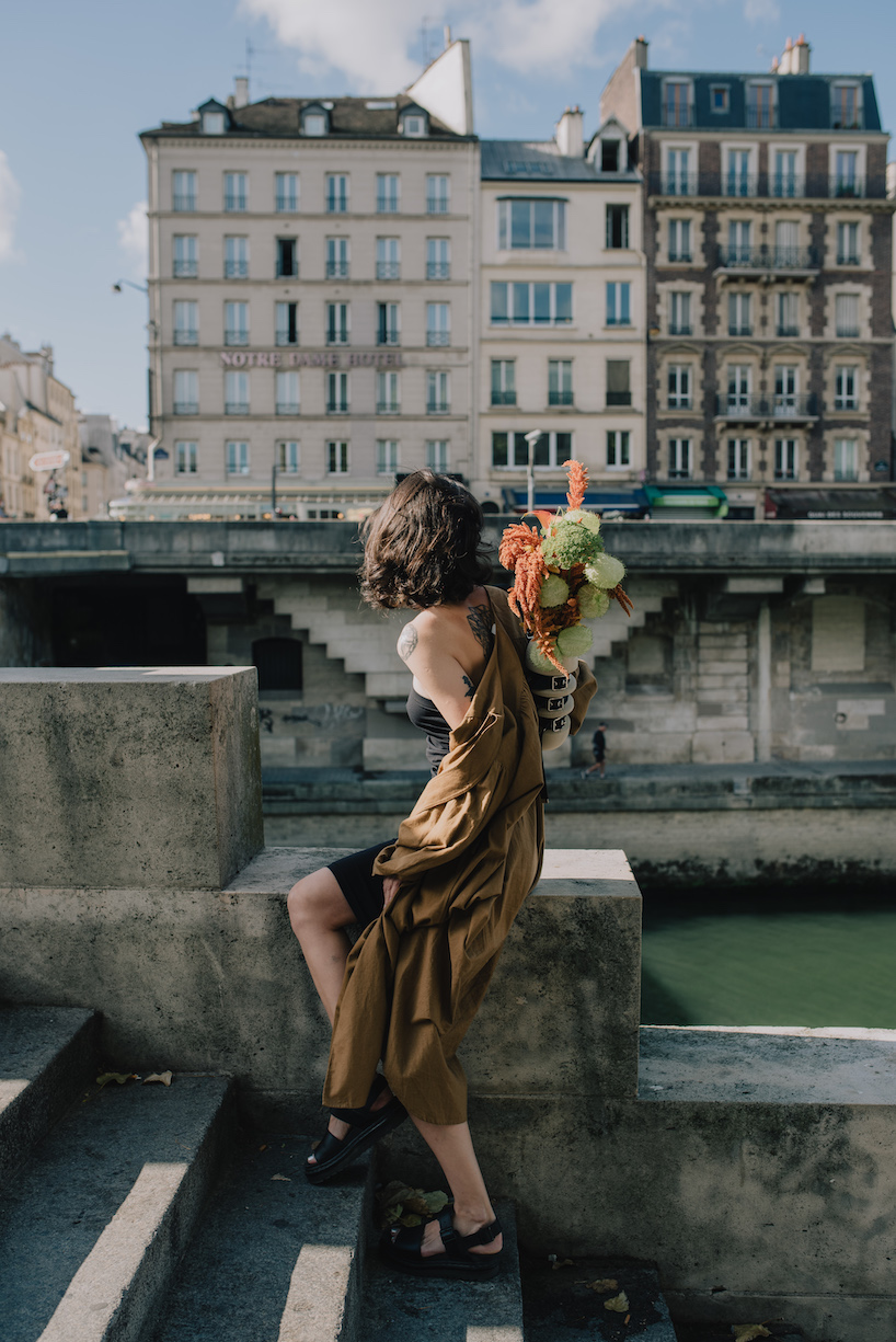 carry your flower bouquets everywhere with this wearable vase by evgeniia kazarezova