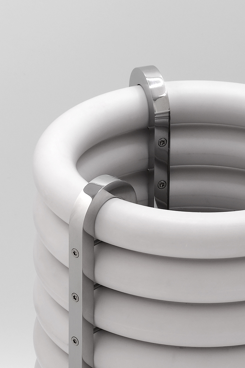 wa upcycled table lamp by akasaki & vanhuyse is crafted from retired tokyo train parts