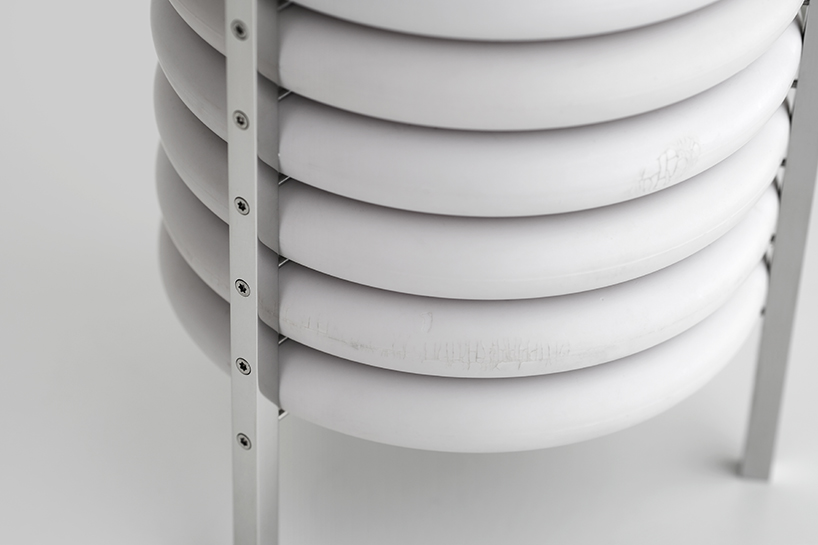 wa upcycled table lamp by akasaki & vanhuyse is crafted from retired tokyo train parts