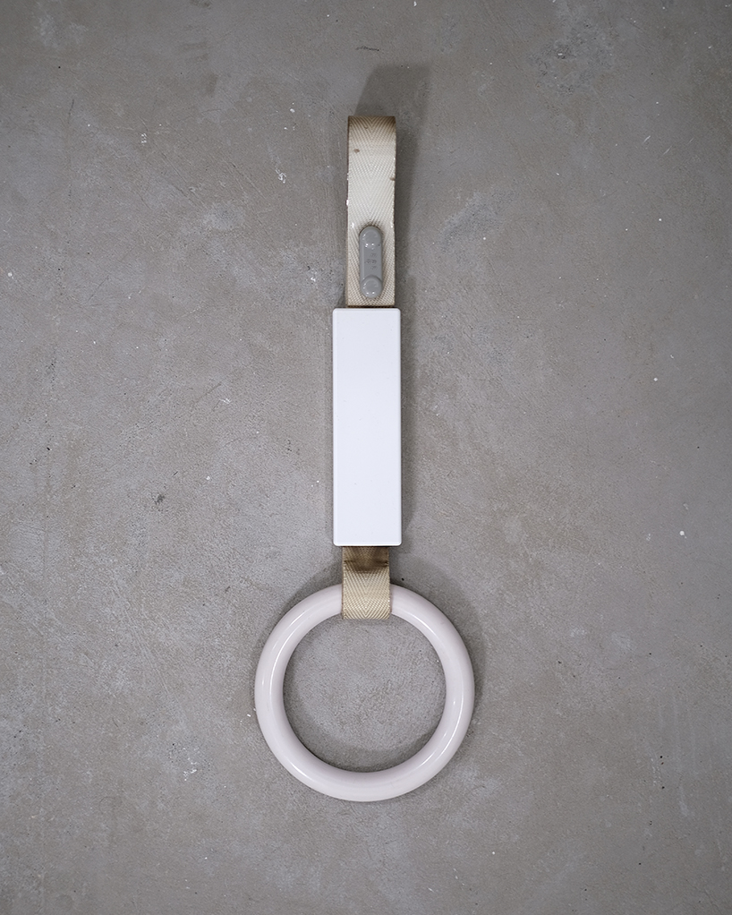 wa upcycled table lamp by akasaki & vanhuyse is crafted from retired tokyo train parts