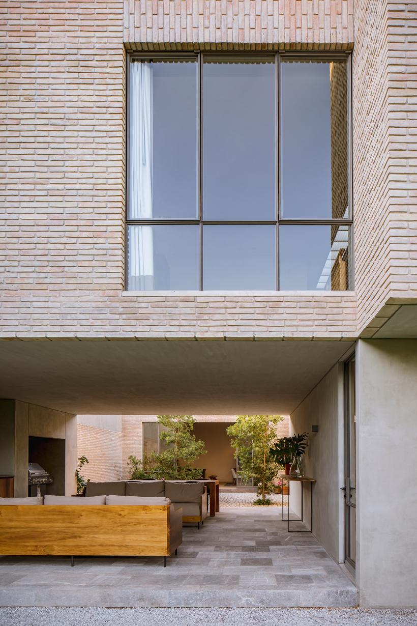 asps white clay brick residence revolves around interior courtyards in mexico city 6