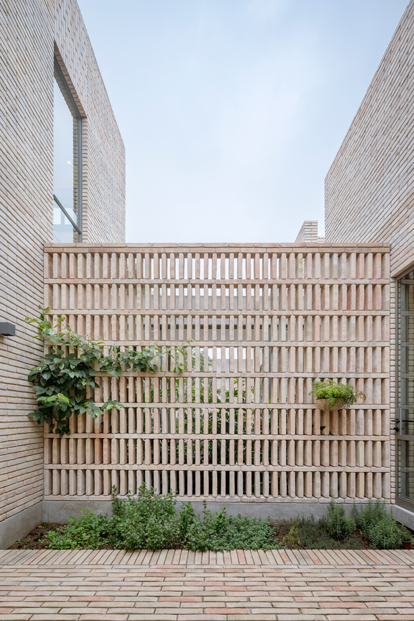 asps white clay brick residence revolves around interior courtyards in mexico city 7