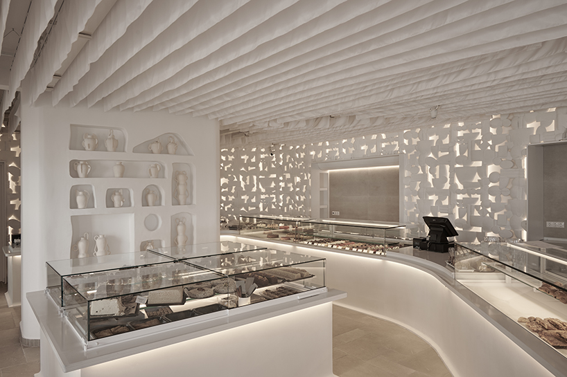 cycladic forms and traditions shape saint of athens' cavernous tserkie patisserie in paros