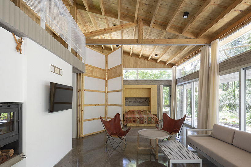 mobile wood and metal structures enable flexibility at estudio galera's buenos aires home