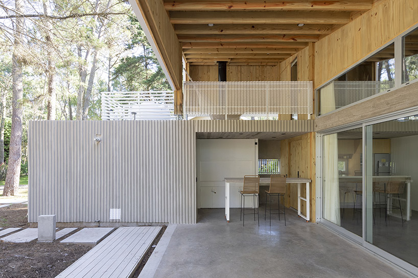 mobile wood and metal structures enable flexibility at estudio galera's buenos aires home