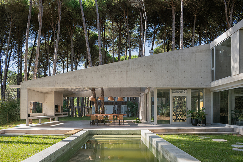 triangular concrete wedge shelters estudio galera's kairos house in argentina