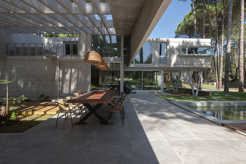 triangular concrete wedge shelters estudio galera's kairos house in argentina